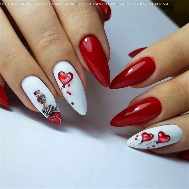 Unhas esmaltadas de vermelho e branco 