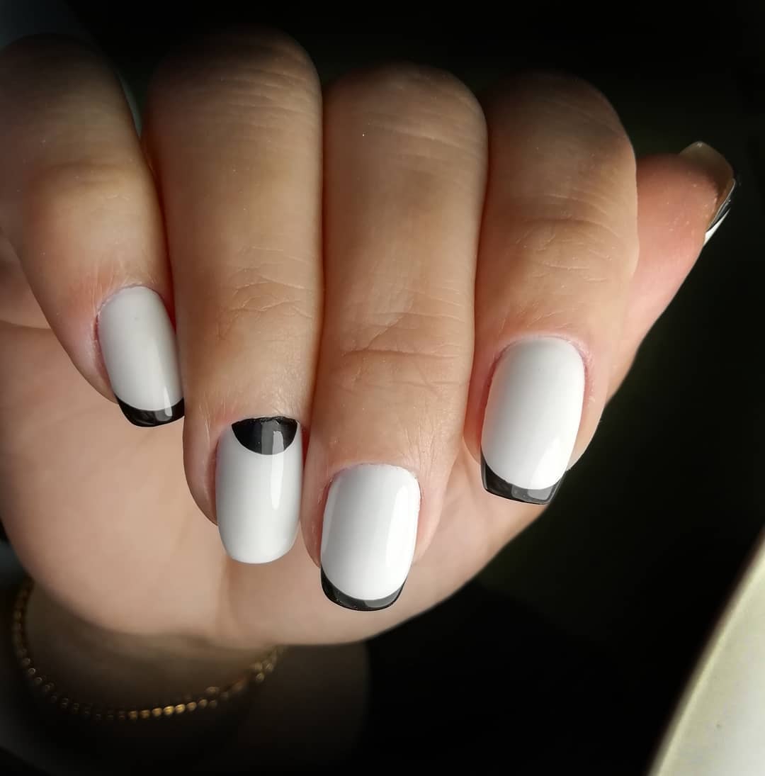White nails with black francesinha
